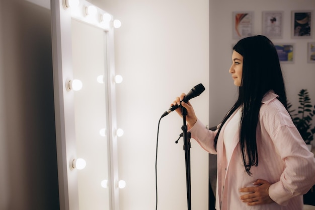 Group singing lessons class with participants learning vocal performance skills together